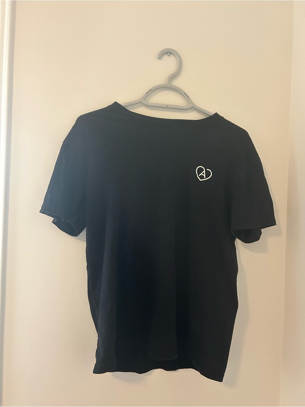 Aritzia Black Short Sleeve Tee with Small White Heart Logo